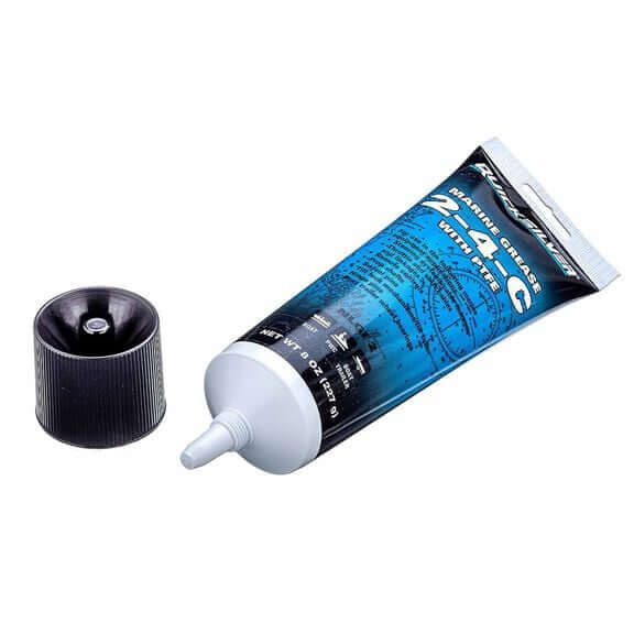 Blue tube of grease with a black cap on a white background