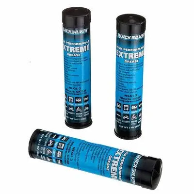 Three tubes of QuickSilver Extreme Performance Grease on a white background