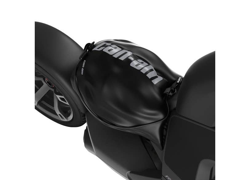Can-Am black helmet bag mounted on Ryker three-wheeler front storage compartment