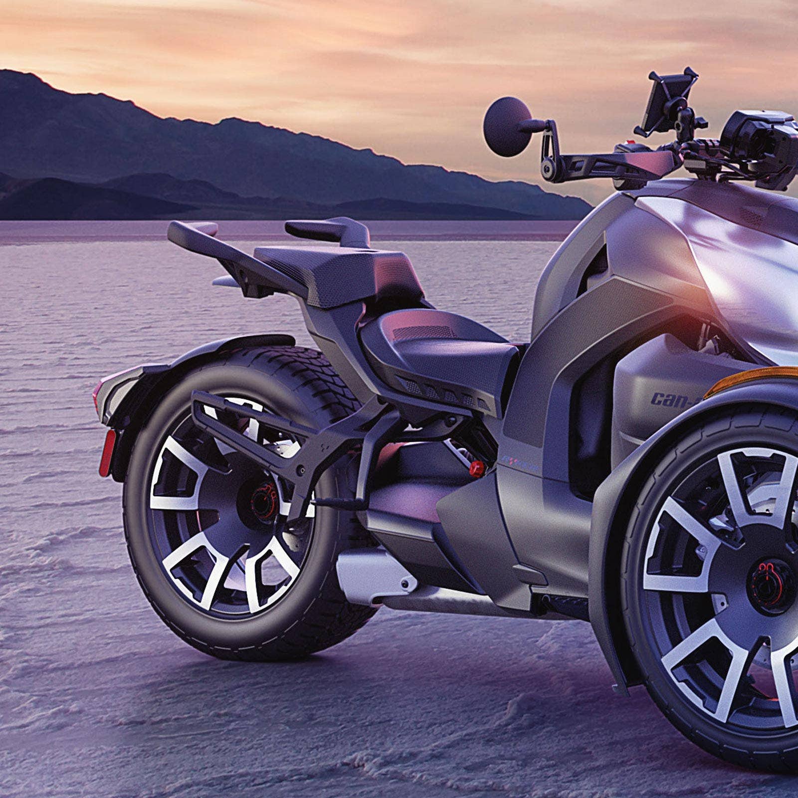 Can-Am Ryker three-wheeler rear view showing passenger seat and dual rear wheels on salt flats