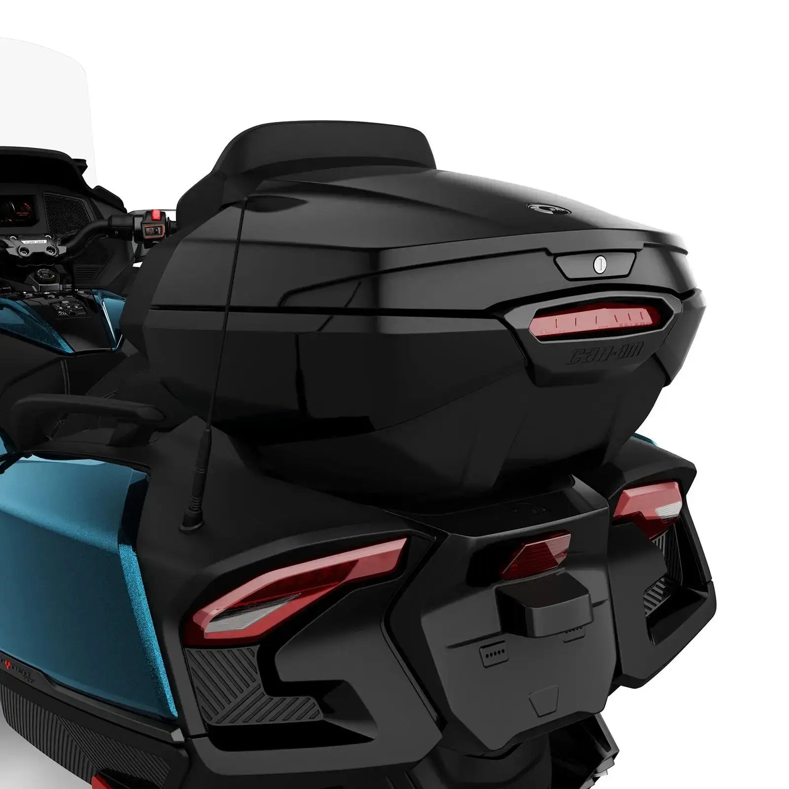 Close-up of a motorcycle with a black luggage compartment on a white background