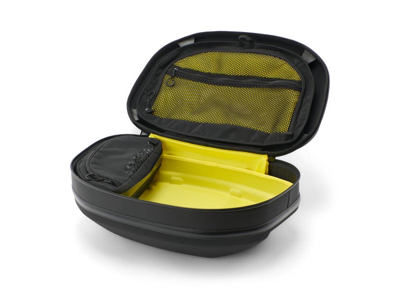 Can-Am LinQ semi-rigid bag open showing yellow interior and mesh pocket, fits Ryker and Spyder RT