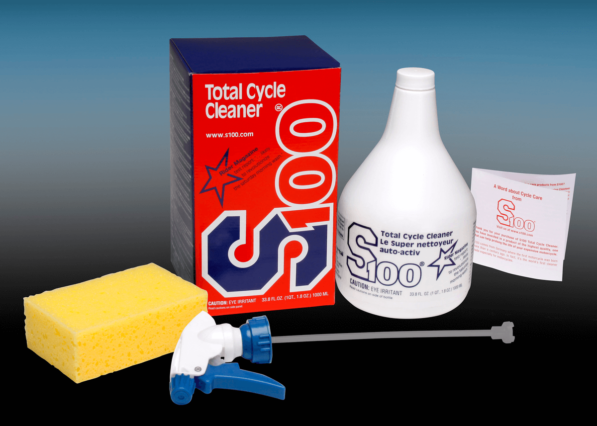 S100 Total Cycle Cleaner packaging with bottle, sponge, and applicator on a gradient background