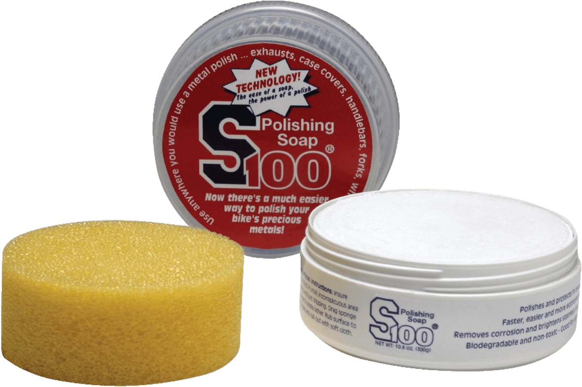 Polishing soap with a yellow sponge and white container on a white background