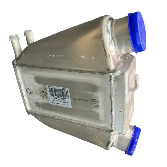 Intercooler assembly for Sea-Doo RXPX 255 and GTX models, featuring protective caps and tubing for dual intake.