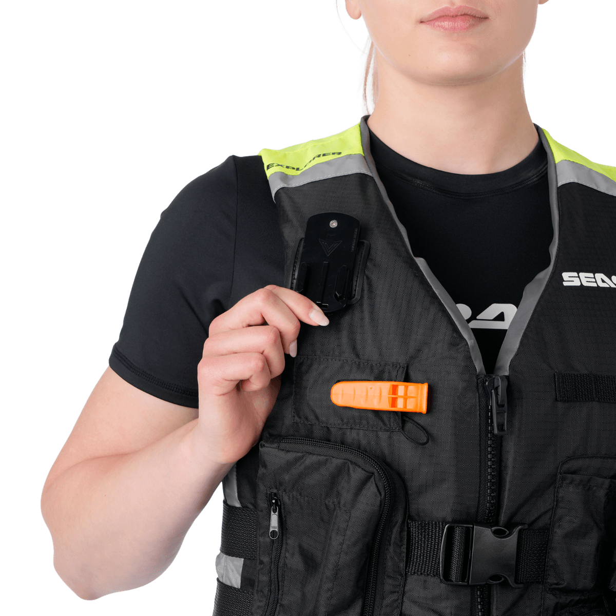 A man in a life jacket showing off a camera attachment point