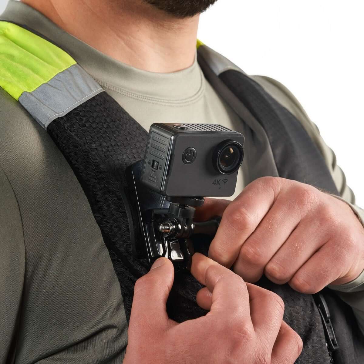 A man with a camera attached to his chest