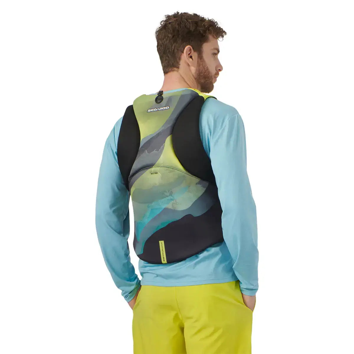 Man wearing Sea-Doo Airflow Sunset Edition life jacket, showcasing back design and comfortable fit for water activities.