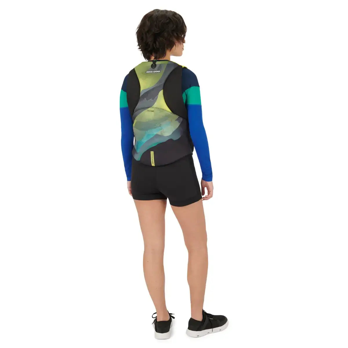 Back view of a person wearing the Sea-Doo Airflow Sunset Edition PFD Life Jacket, showcasing its breathable design.