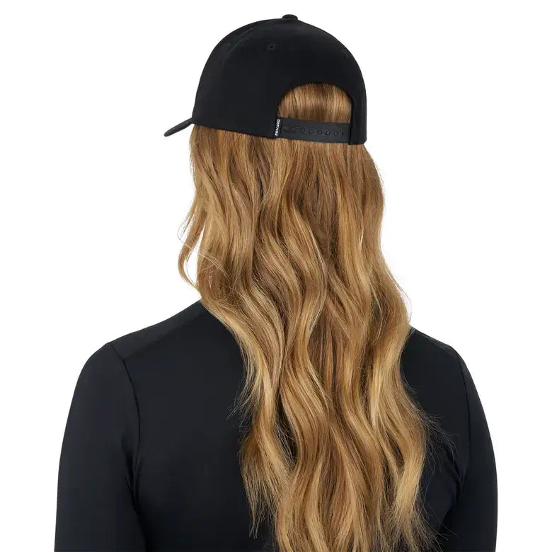 Back view of Sea-Doo unisex Wave Signature cap showing snapback closure and long wavy hair.