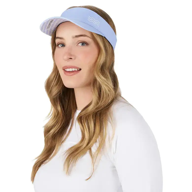 Woman wearing a light blue Sea-Doo sun protection visor with a wave logo, ideal for outdoor activities.