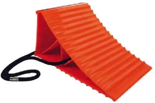 Orange wedge-shaped object with a black strap on a white background