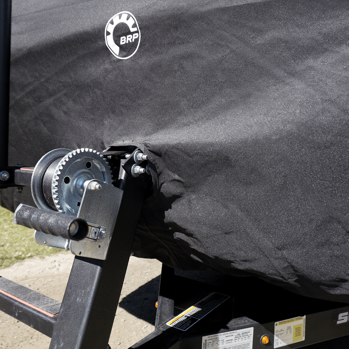 Sea-doo switch pontoon with a trailering cover, close up on trailer winch