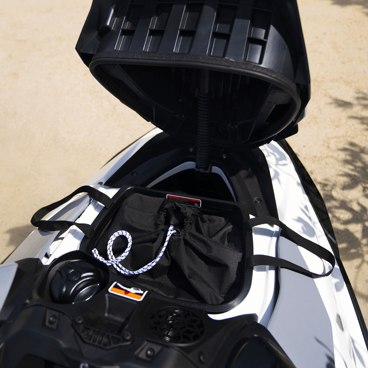 Sea-Doo removable storage bin organizer with drawstring bag installed in front storage compartment