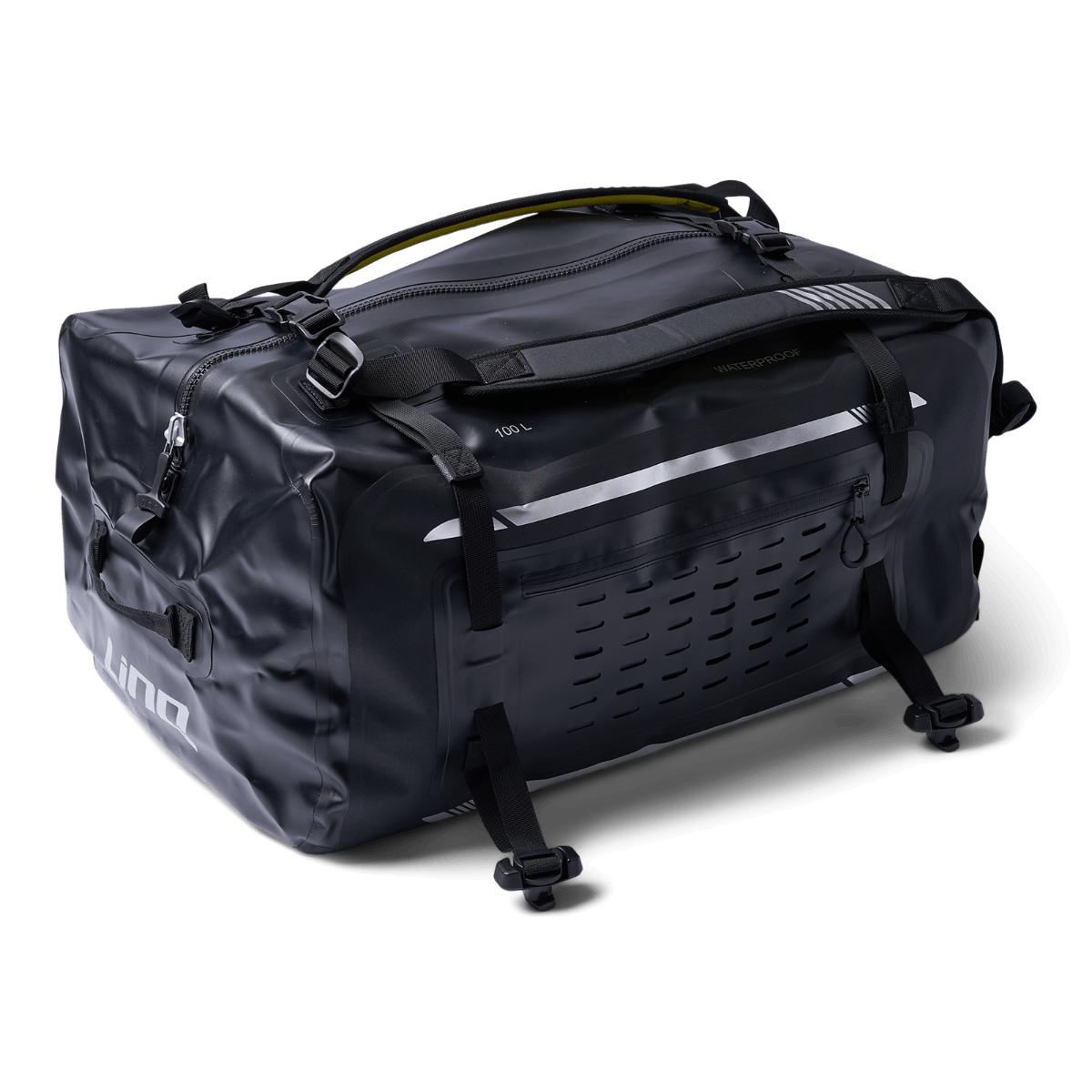 A black duffel bag sitting on a black surface