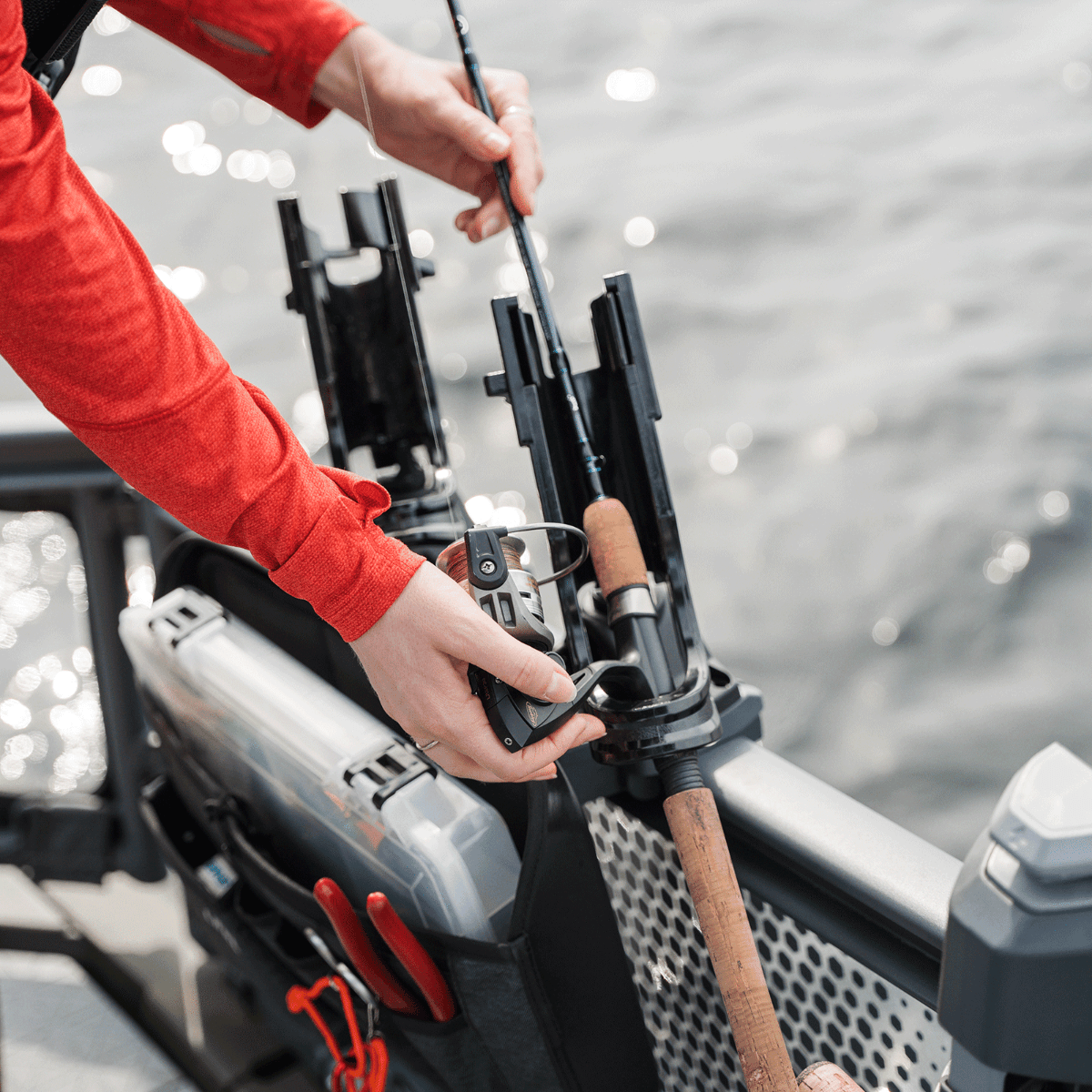 Sea-Doo Rail Rod Holder with LinQ Lite mounted on Switch pontoon, holding fishing rod