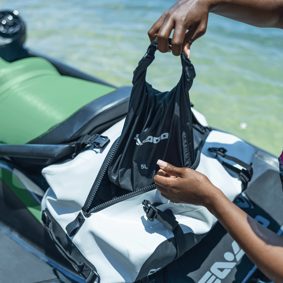 Sea-Doo LinQ 50L dry bag with 5L waterproof pouch attached to PWC seat