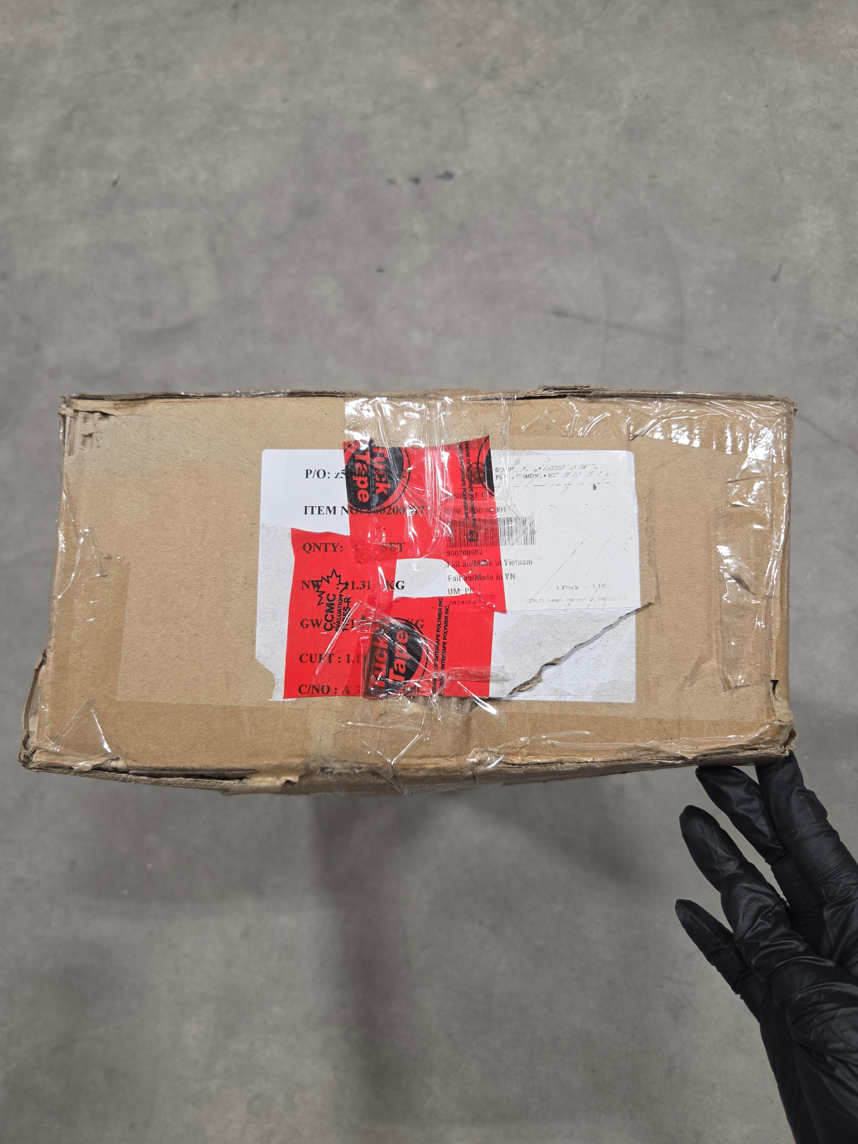 Ski-Doo heavy-duty front bumper 860200987 sealed shipping box with warehouse label