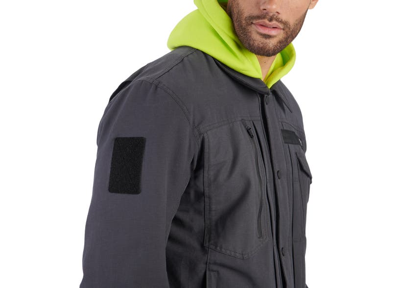 Can-Am Veda Chore jacket in gray with hi-vis hood and Velcro patch panel on sleeve, close-up