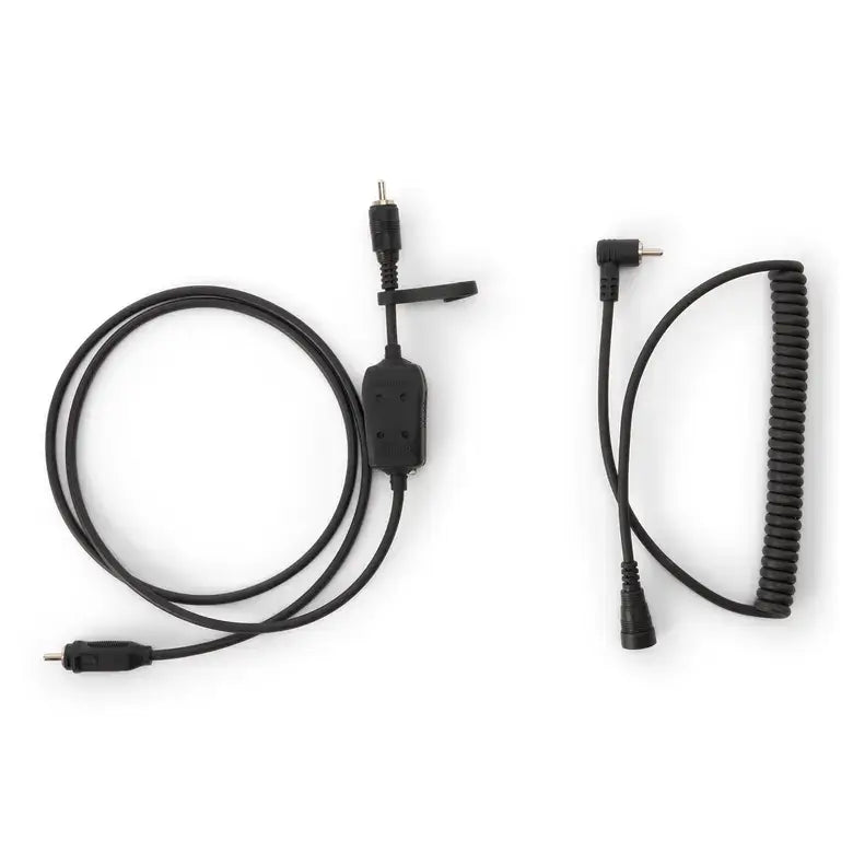 Black coiled cable with connectors on a white background