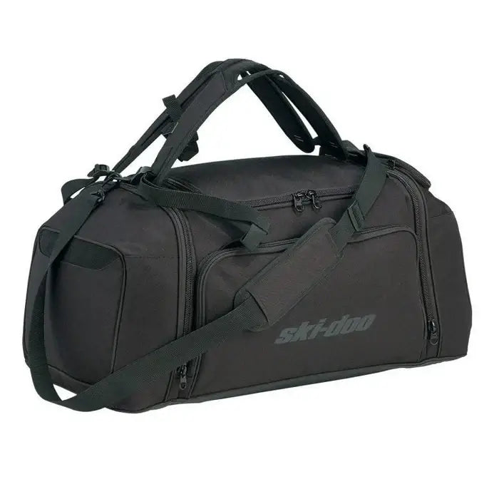 Black duffel bag with shoulder strap on a white background