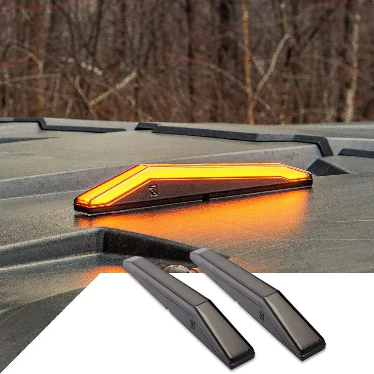 Orange LED light bar on a vehicle roof with additional components below.