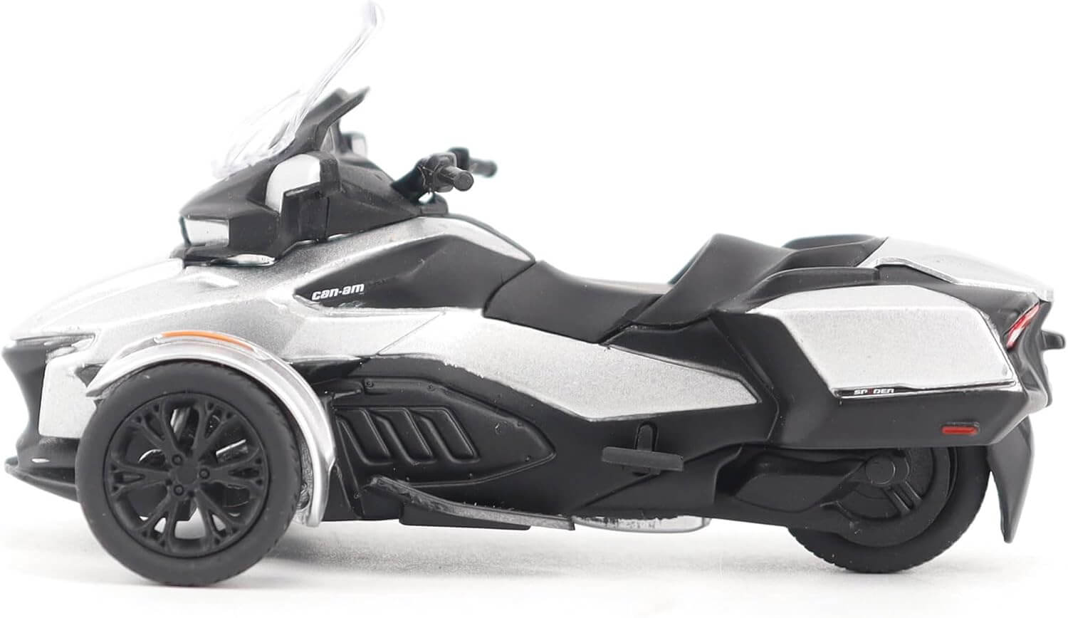 Model of a three-wheeled model vehicle on a white background