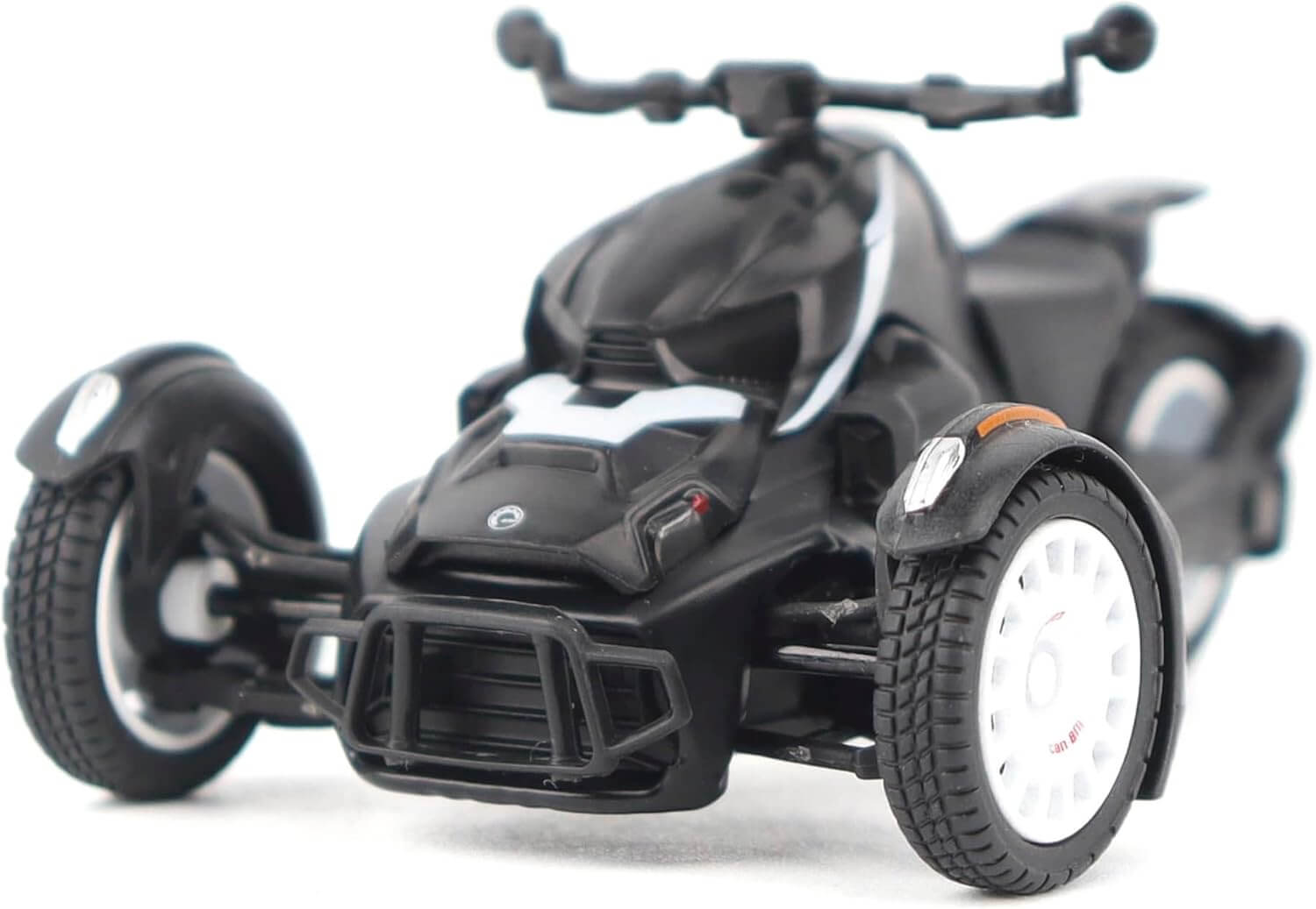 Black three-wheeled vehicle model on a white background
