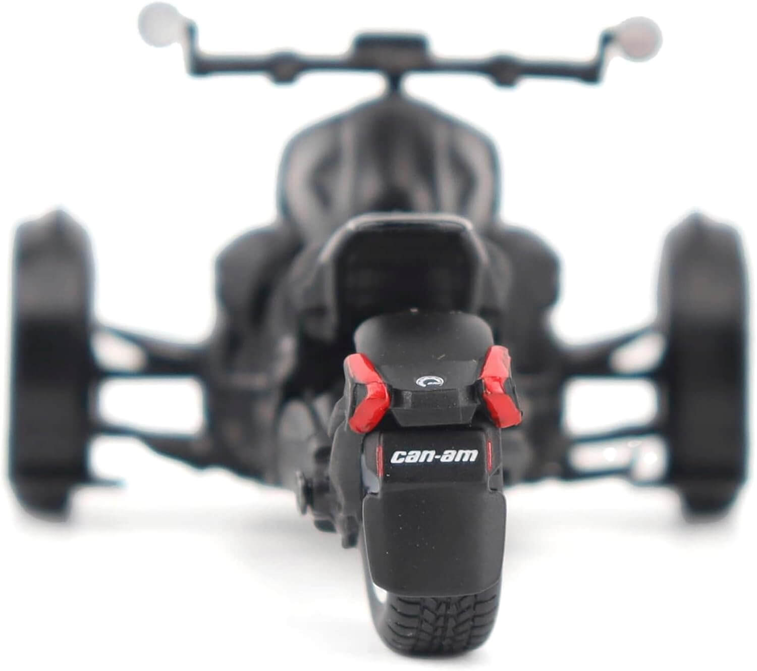 Black three-wheeled model vehicle with 'Can-Am' branding on a white background