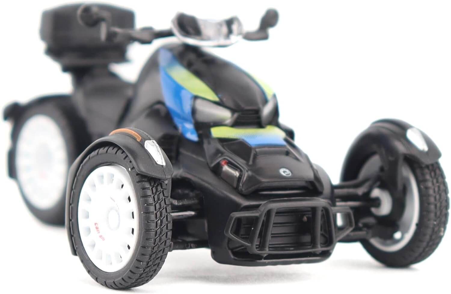Toy vehicle with three wheels on a white background