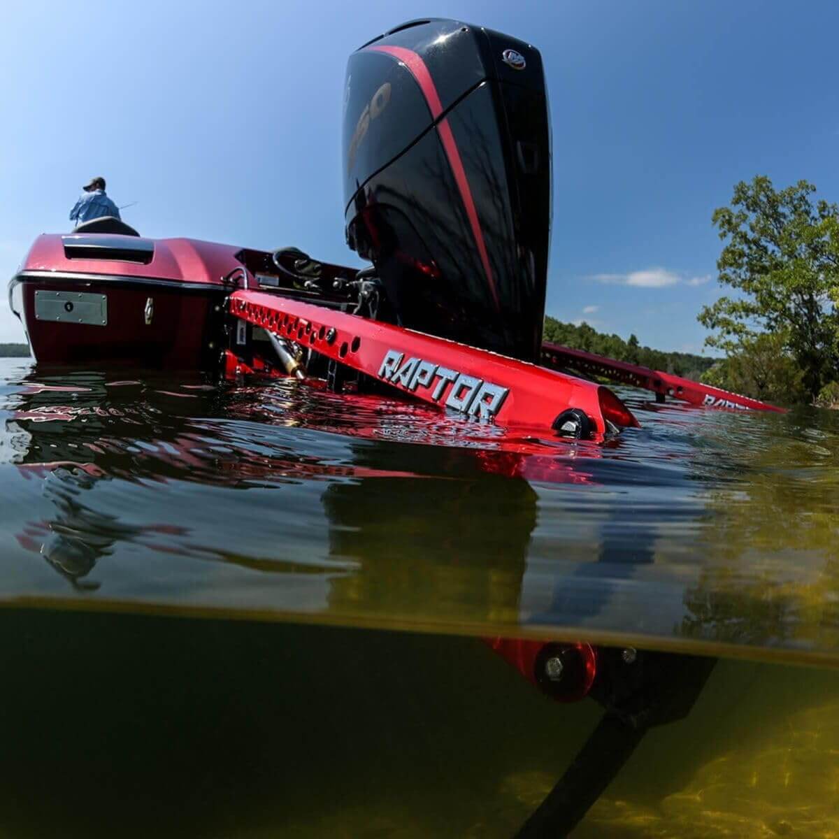 Minn Kota 1810620 Raptor Shallow Water Anchor wtih Active Anchoring, 8', Black in water with boat.