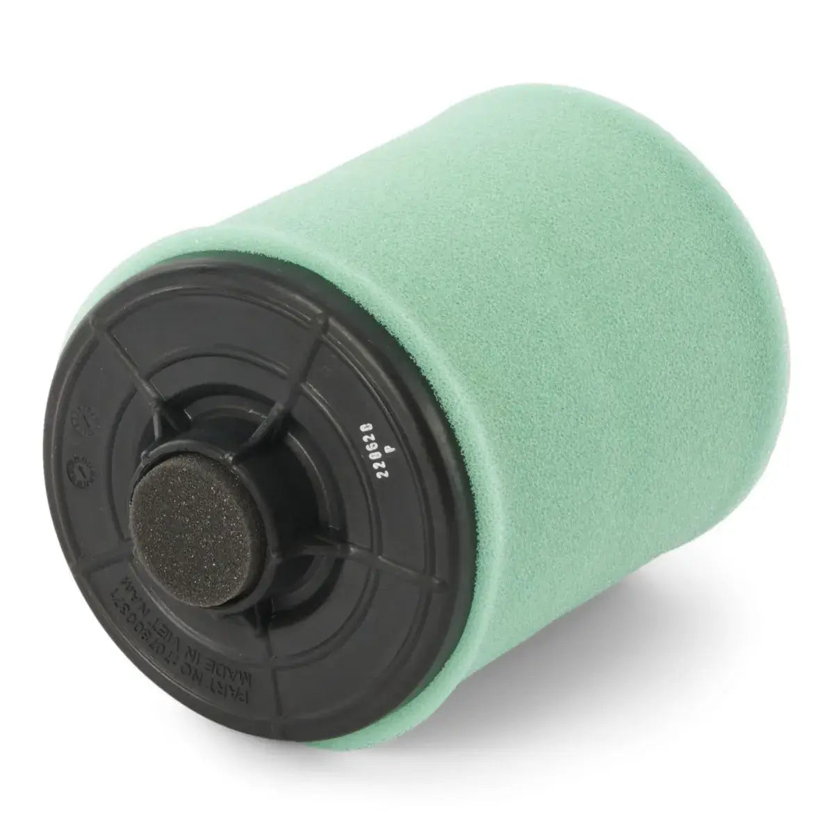 Green foam roller with black handle on a white background
