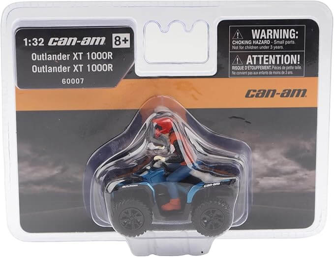 Model ATV in packaging with Can-Am branding and warning label.
