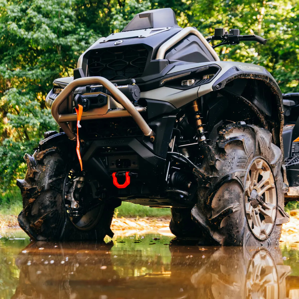 Can-Am Outlander Front Tow Hook on an Outlander in the mud, 715010191