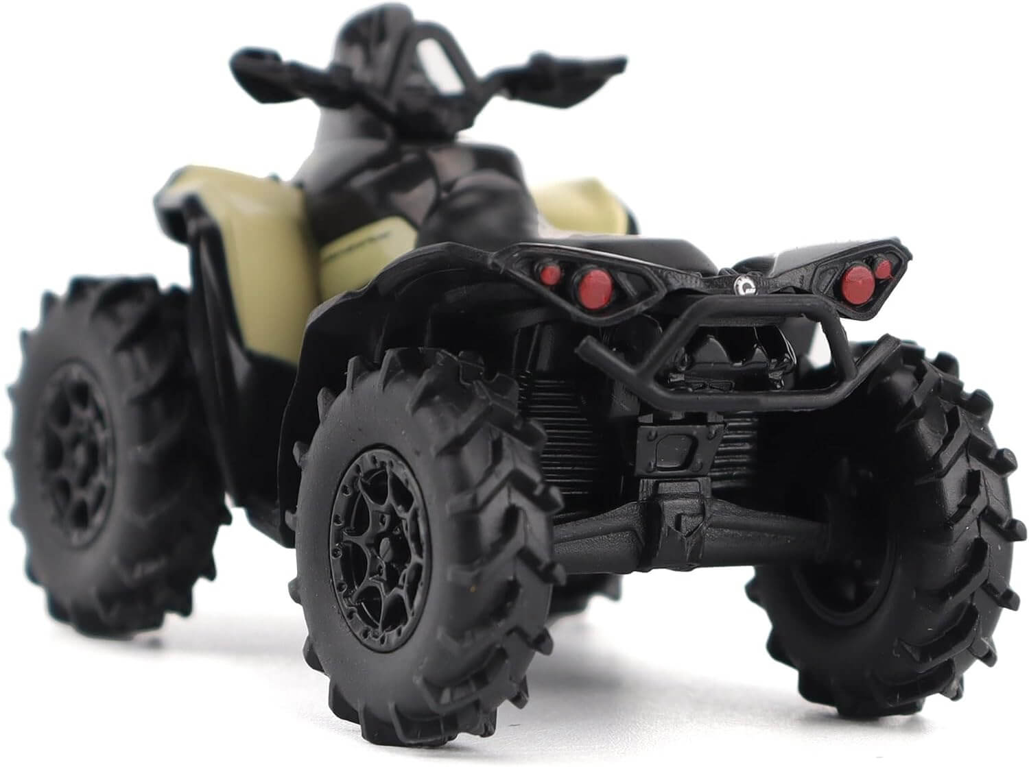 Toy ATV with large wheels on a white background