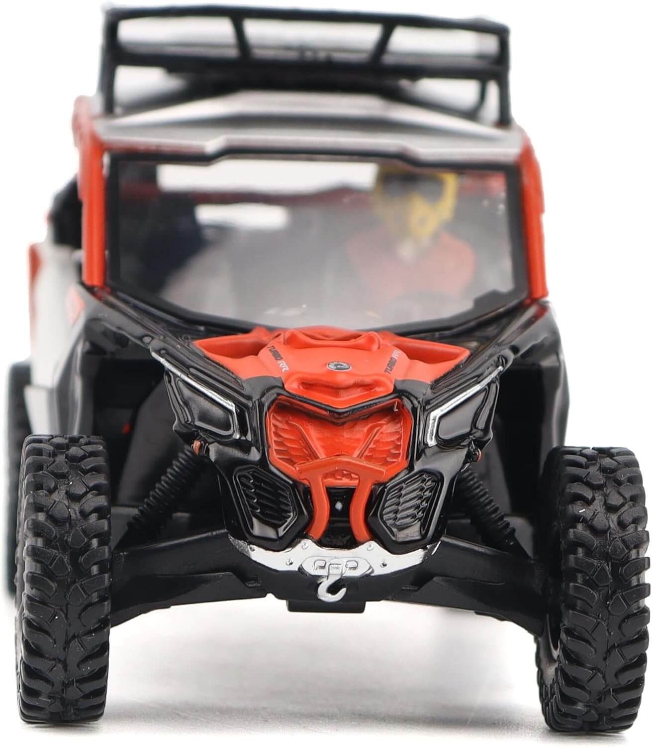 Model of a red and black off-road vehicle on a white background