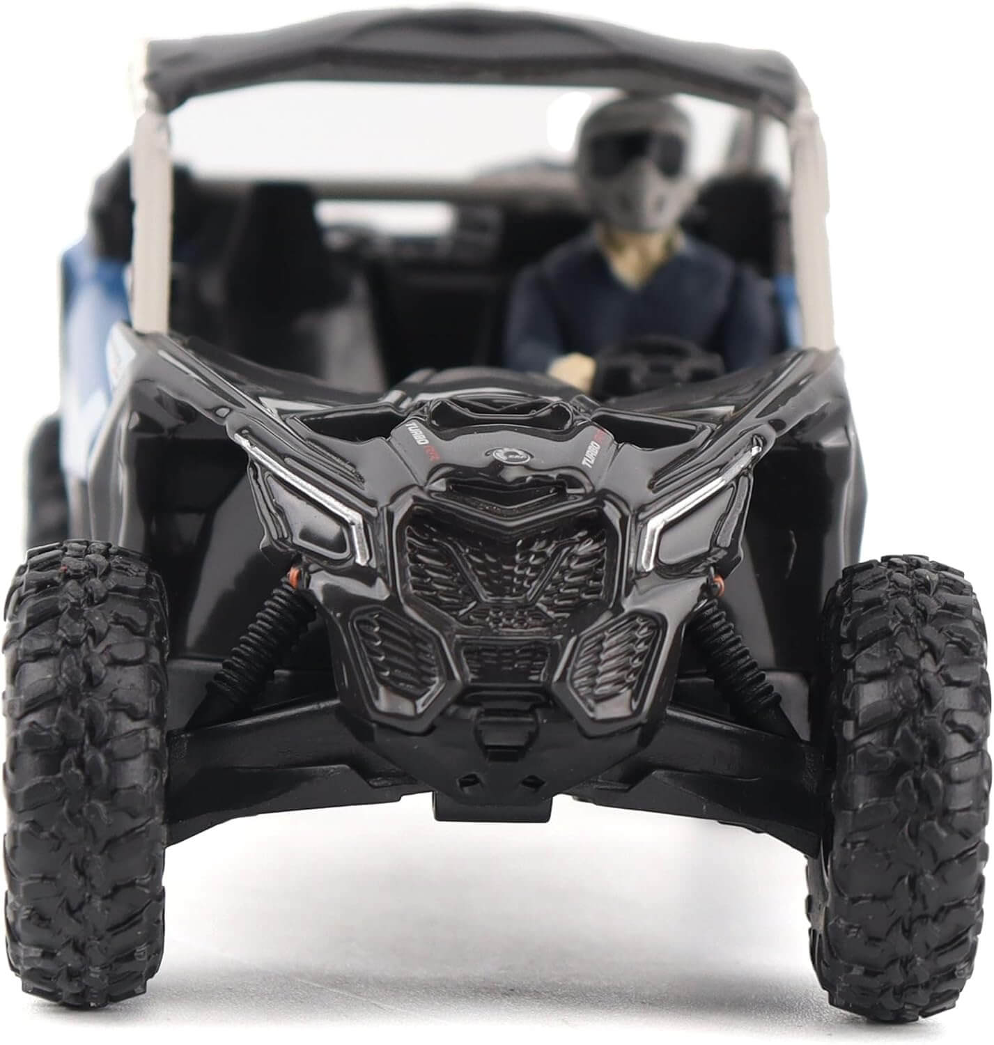 Black off-road model vehicle with a person inside on a white background