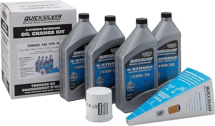 Quicksilver oil change kit with oil bottles and filter on a white background