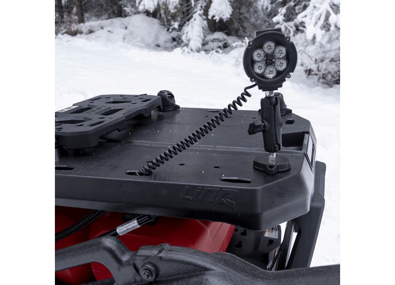Ski-Doo LinQ working light mounted on REV Gen5 snowmobile tunnel, LED light close-up, 860202380