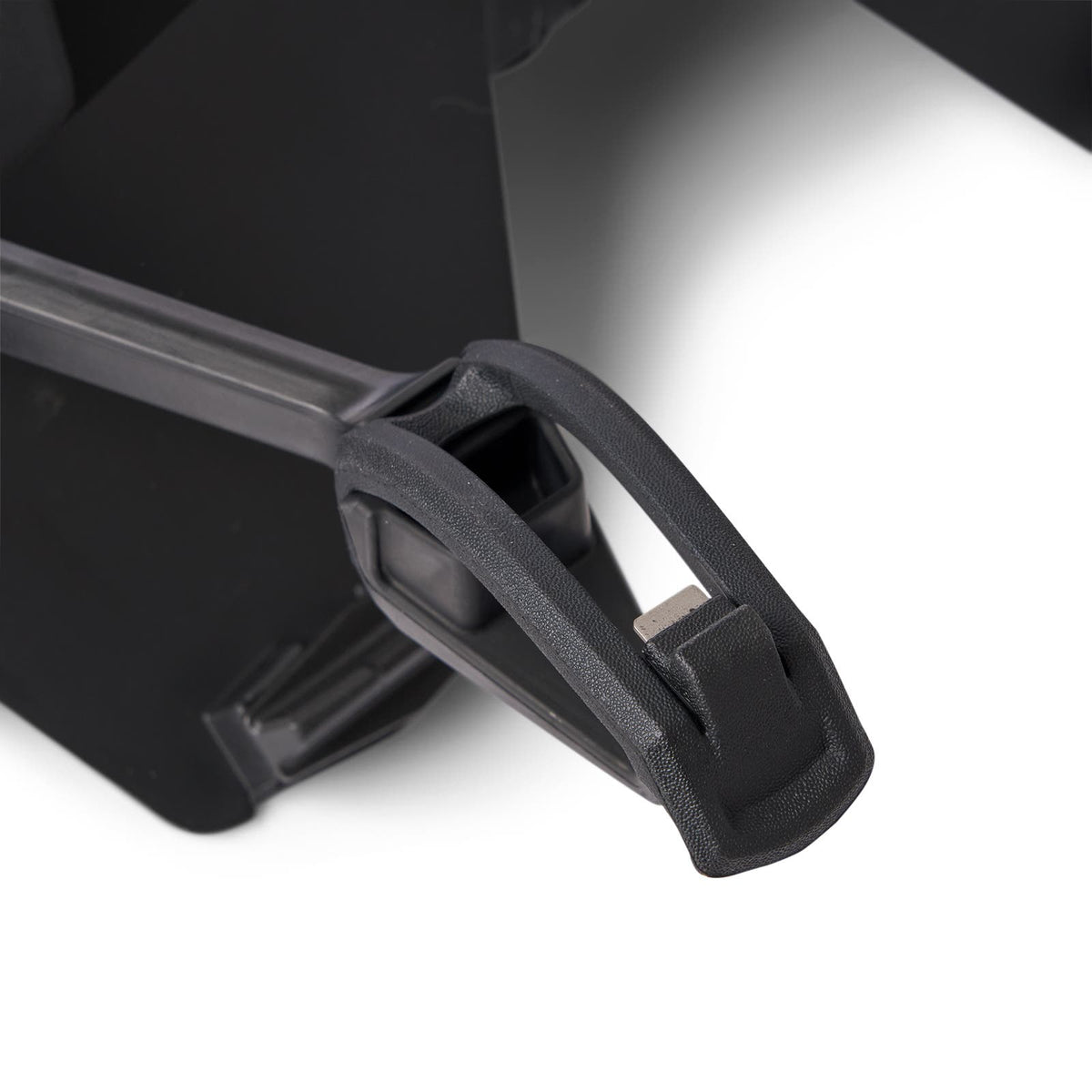 Ski-Doo LinQ snowflap extension closeup showing black mounting bracket and latch handle, 860202393