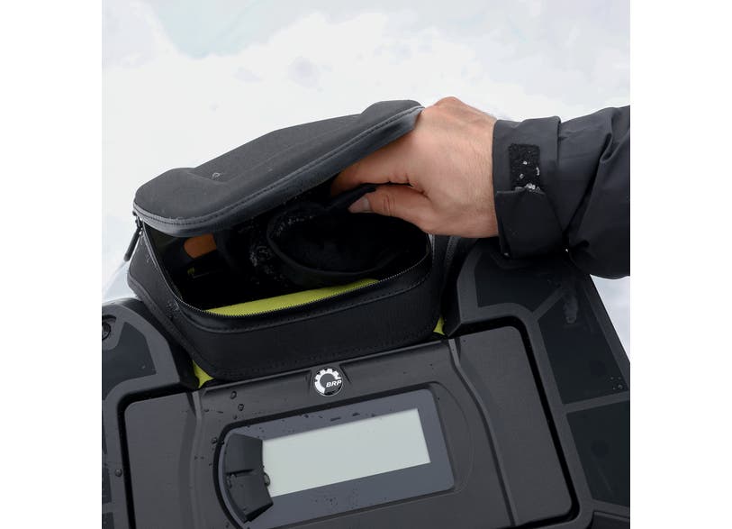 Ski-Doo 4.8 L Soft Glove Box Extension in black mounted on snowmobile console, rider opening lid