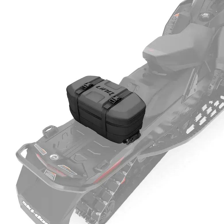 Black storage box on snowmobile on white background