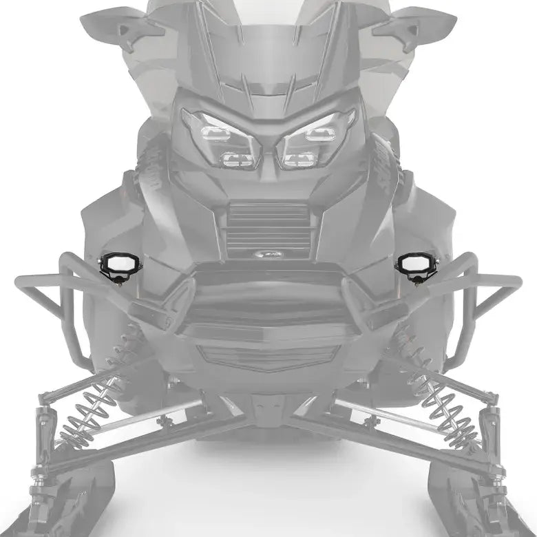 Close-up of a snowmobile's front section with visible suspension and frame details.