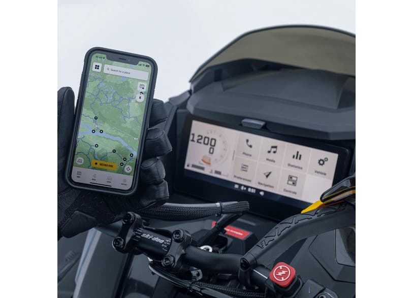Ski-Doo GPS Module with Group Ride app map view next to snowmobile digital display, 860202990