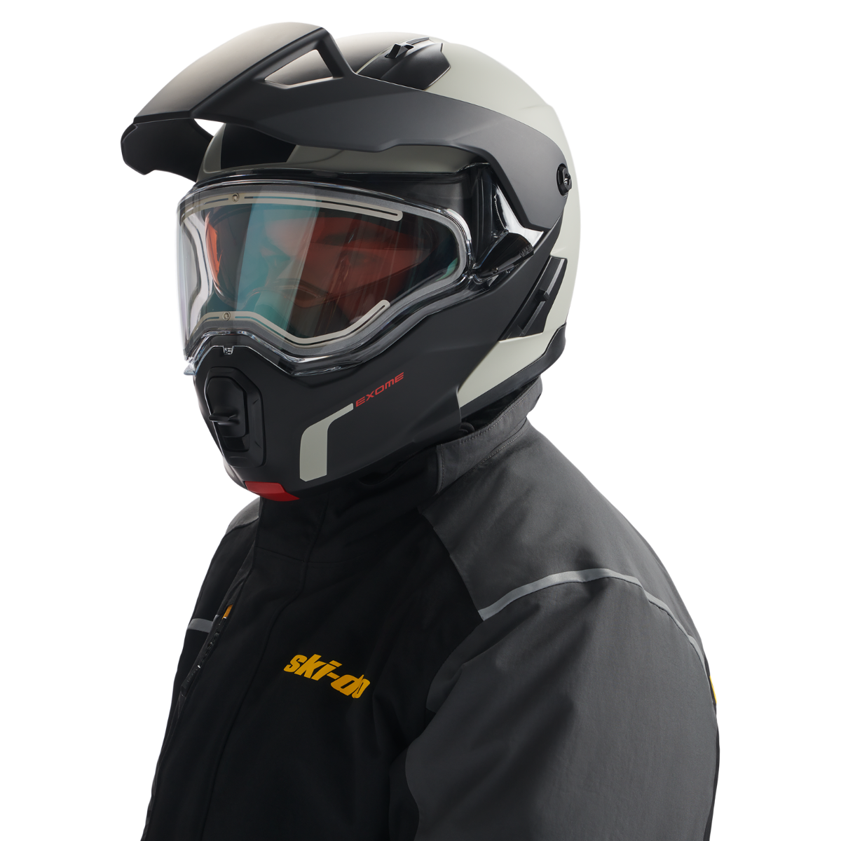 Rider wearing the Ski-Doo Exome Sport Heated Helmet 929037 in Charcoal Grey