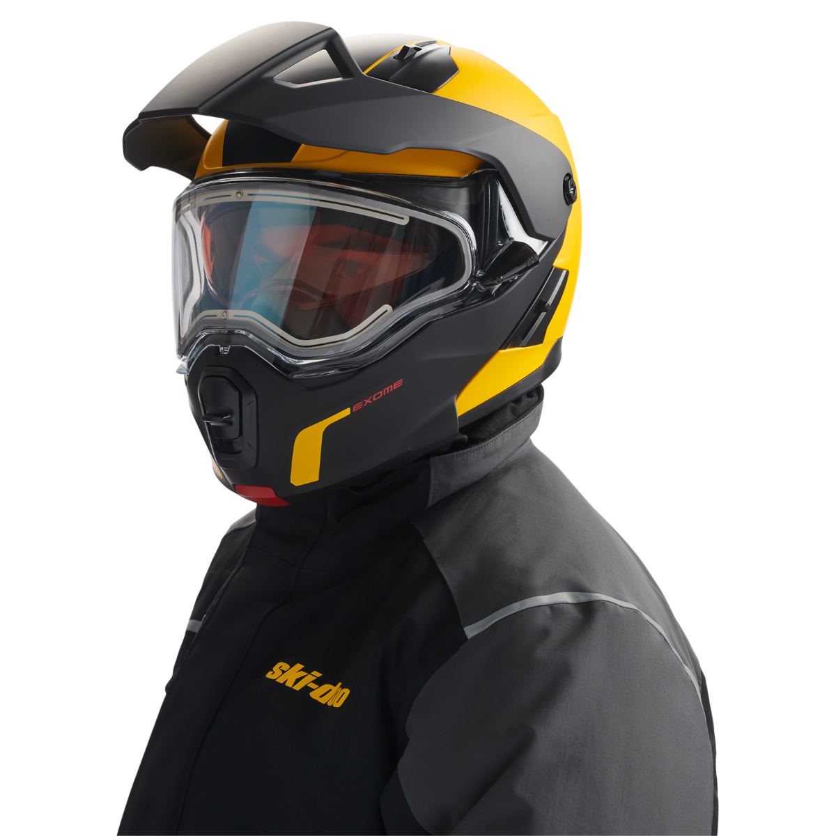 Rider wearing the Ski-Doo Exome Sport Heated Helmet 929037 in Yellow