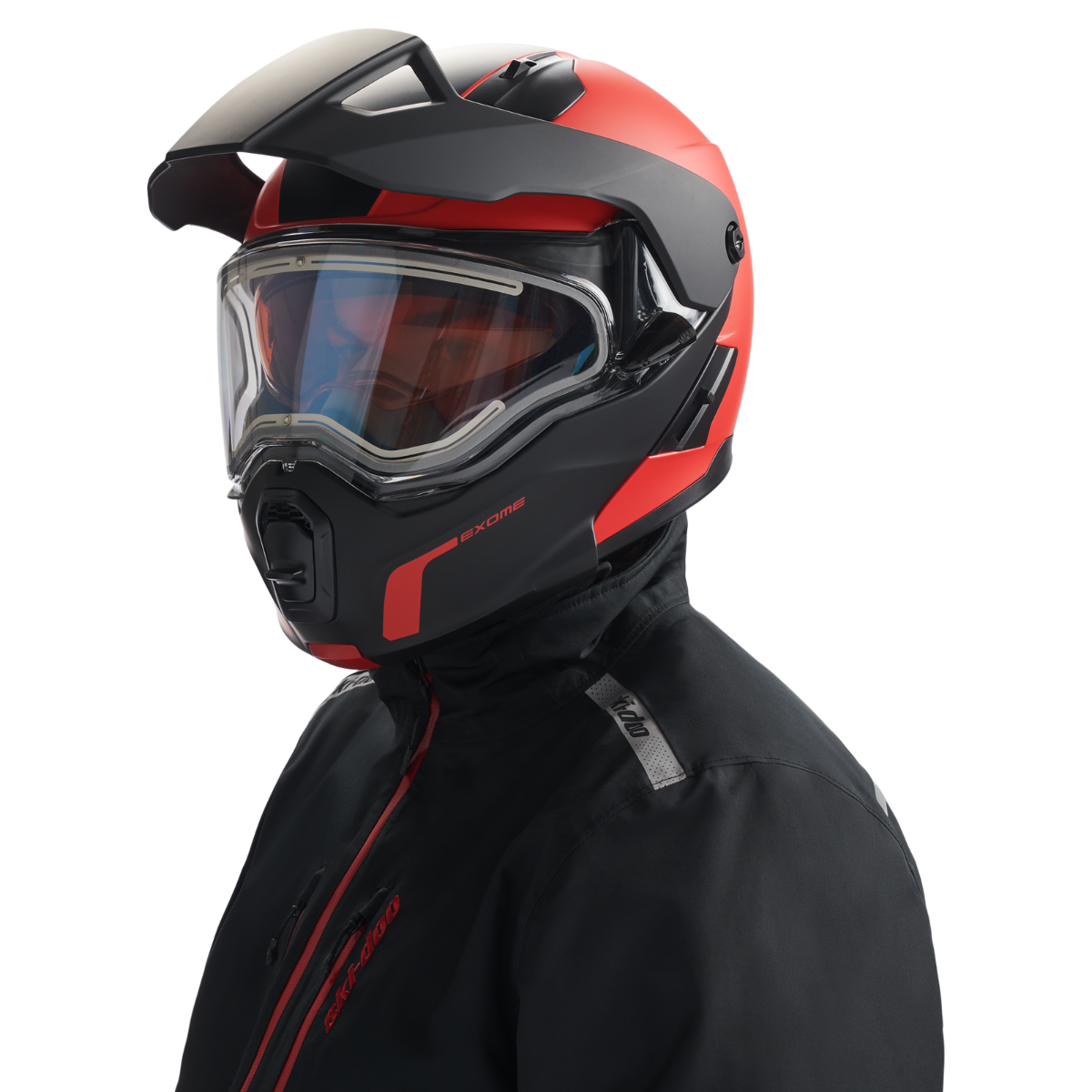 Rider wearing the Ski-Doo Exome Sport Heated Helmet 929037 in Red, front view