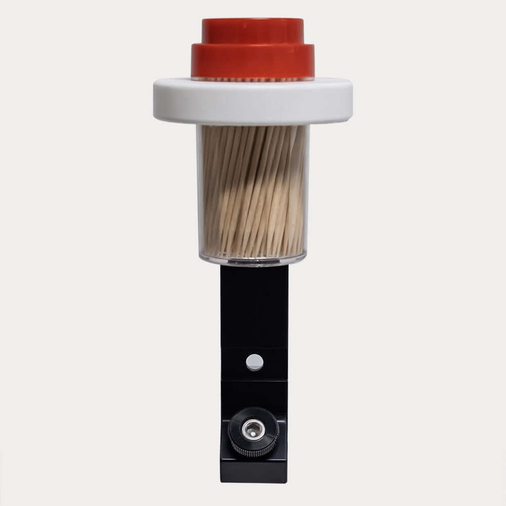 toothpick holder from custom fishing solutions attached to black bracket on white background