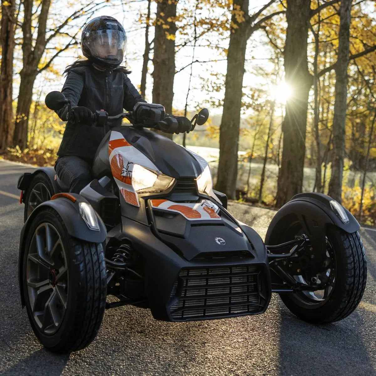 Can-Am Ryker with Exclusive Panel Kit in Cyber Orange on the road, 219401279
