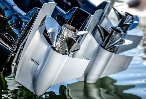 Close-up of boat propellers on a water surface